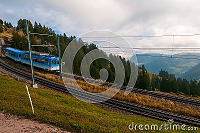 Cogwheel train on Rigi Mountain, Swiss Alps Editorial Stock Photo