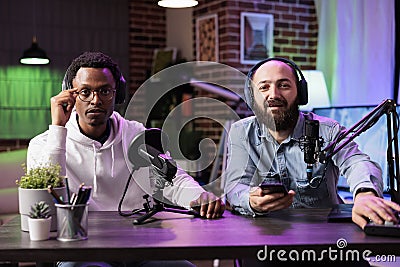 Cohosts presenting entertaining show Stock Photo