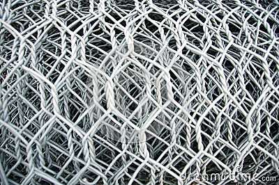 Coiled chain fence Stock Photo