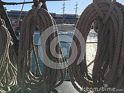 Coiled ropes on sailing ship Stock Photo