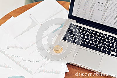 Coin bitcoin on the laptop keyboard. the concept of trading cryptocurrency. The rapid growth of the currency. Stock Photo