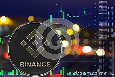 Coin cryptocurrency binance on night city background and chart. Editorial Stock Photo