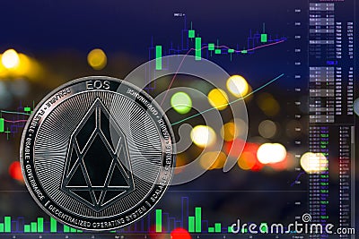 Coin cryptocurrency EOS on night city background and chart. Editorial Stock Photo