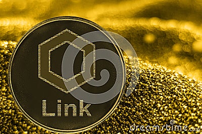 Coin cryptocurrency link chainlink token on golden background. Editorial Stock Photo