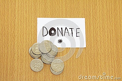 Coin and donate money Stock Photo