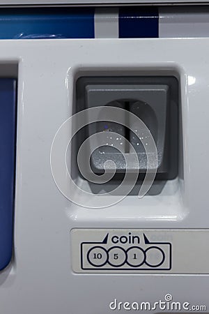 coin input slot Stock Photo