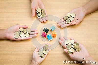 coin money on humen hand,finance and banking, The concept of saving money and buying a home. Stock Photo