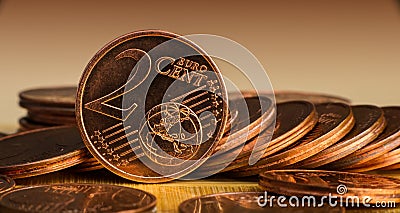 Coin of two euro cents in the background of coins. Stock Photo