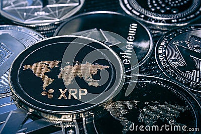 Coin XRP cryptocurrency on the background of the main altcoins Editorial Stock Photo