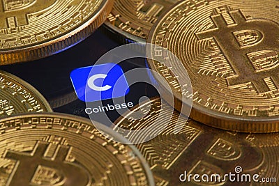 Coinbase logo and Bitcoins Editorial Stock Photo