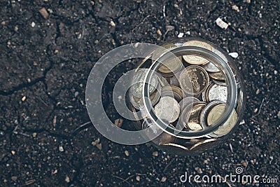 Coins in the bottle, Money growing concept and the goal success Stock Photo