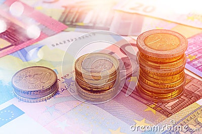 Coins Chart on Euro Banknotes Stock Photo