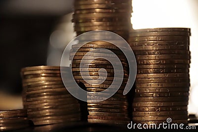 coins close-up. stacks of coins and chaotically scattered coins Stock Photo