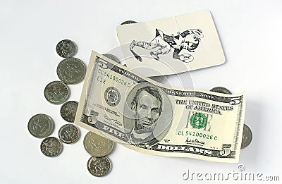 Coins and five dollars Stock Photo