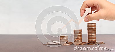 Coins in hand stacks Labeled Retirement ,business idea Stock Photo