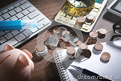 Coins, house model and keys with a business objects Stock Photo