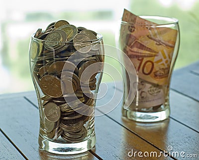 Coins and note drink for charity Stock Photo