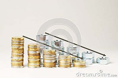 Coins and nut bolts closeup. The concept of financial problems or production efficiency. Copy space Stock Photo