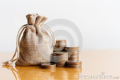 Coins stack and sack. Stock Photo