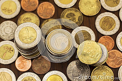 Coins Stacks, Various Currencies, Saving Concept Stock Photo