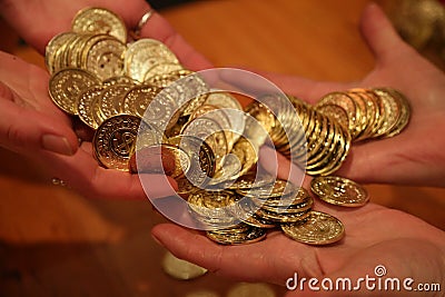 Coins transferr hands Stock Photo