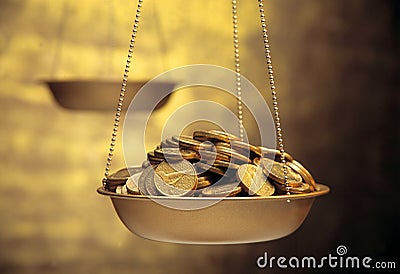 Coins on weighing machine Stock Photo