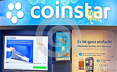 Coinstar coin cashing machine for loose change conversion in cash money paper currency or gift cards Editorial Stock Photo