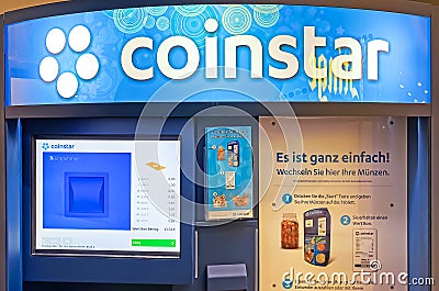 Coinstar coin cashing machine for loose change conversion in cash money paper currency or gift cards Editorial Stock Photo