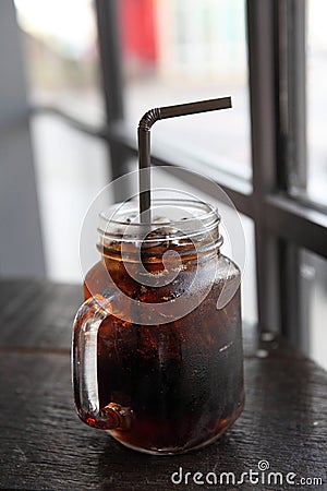 Cola drinking on wooden table Stock Photo