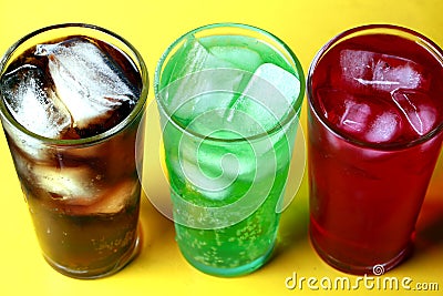 Cola, creme soda and raspberry soda fizzy drinks Stock Photo