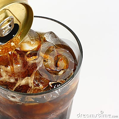 Cola Pouring From A Can Stock Photo