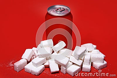 Cola refreshing drink can and lot of white sugar cubes represent Stock Photo