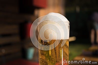 Cold beer in frosty glas, biergarten Stock Photo