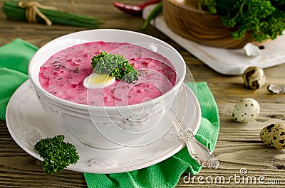 Cold beet soup with egg, cucumber, potatoes and greens Stock Photo