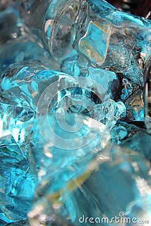 Cold blue,teal and beige colored ice cubes. Stock Photo