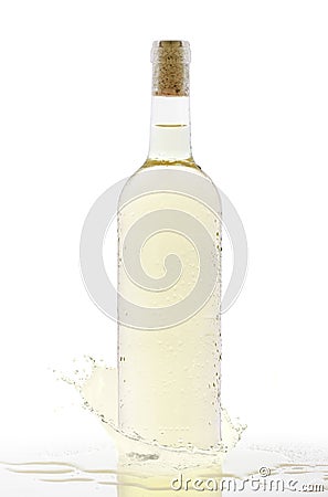 Cold bottle of white wine with a splash Stock Photo