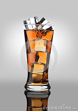 Cold Drink Cola Soda Soft Drink in a Glass with Ice Cubes Stock Photo