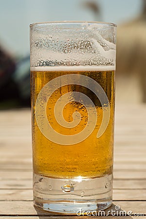 Cold fresh beer on summer at the beach Stock Photo