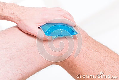 Cold gel compress on the knee Stock Photo