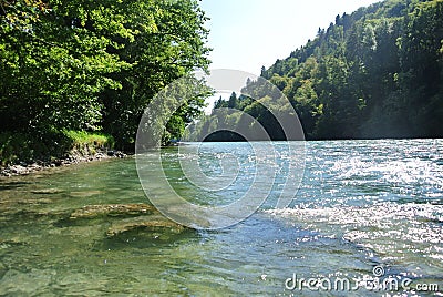 melting river switzerland Stock Photo