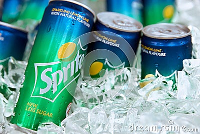 Cold sprite cans on the ice. Brand of soft drink, created by the Coca-Cola Company, Popular soft drink. 18.01.2019 Singapore Editorial Stock Photo