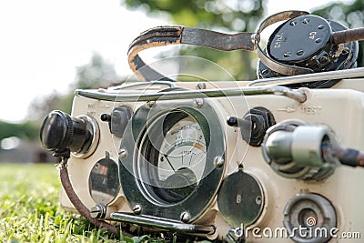 Cold war era geiger counter used for detecting radiation from nuclear weapon fallout. Editorial Stock Photo