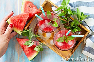 Cold Watermelon Smoothie. Summer Watermelon drink in glasses and slices of watermelon Stock Photo