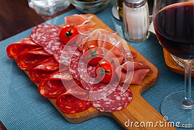 Coldcuts of Spanish cured jamon and sausages Stock Photo