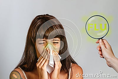 Colds and seasonal viral diseases. A brunette woman sneezes or blows her nose in a handkerchief. Hand with magnifying glass. Text Stock Photo
