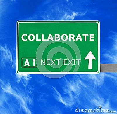 COLLABORATEroad sign against clear blue sky Stock Photo