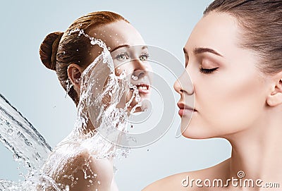 Collage of beautiful women in splashes of water. Stock Photo