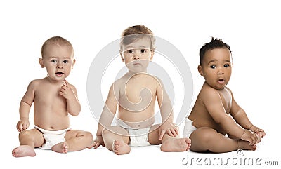 Collage with photos of cute babies in diapers on background Stock Photo