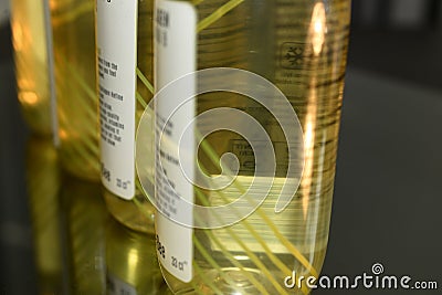 collagen bottles on black background Stock Photo