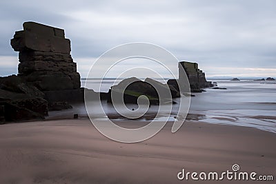 Collapsed harbour wall in Seafield Kirkcaldy, Scotland Stock Photo